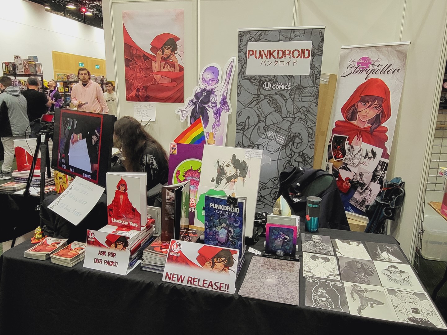 Photo of artwork and comics on display