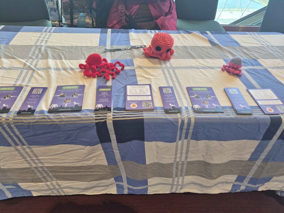 The Octocon table with Octos and flyers